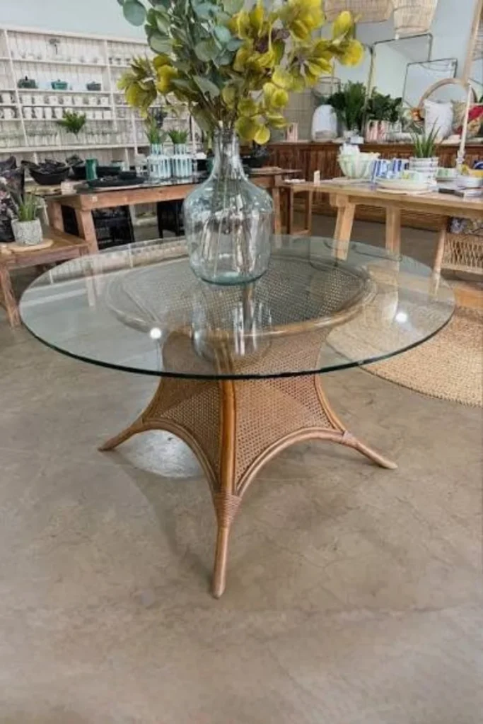 the Compact Round Glass Table with Rattan or Wicker Base
