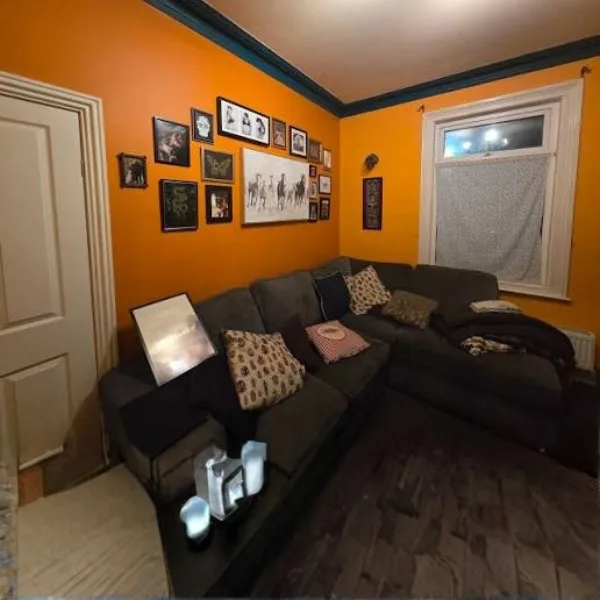 Deep Rust Orange Walls with Dark Wood Styled to Glow the Deep Rust Orange Walls with Dark Wood