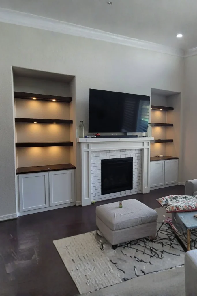 Floating Shelves Flanking a Simple Fireplace Insert Styled to Glow the Floating Shelves Flanking a Simple Fireplace Insert
