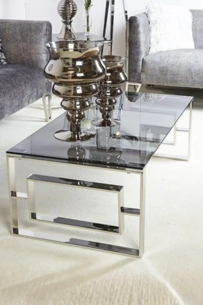 the Low Profile Glass Table with Sculptural Curved Steel Base