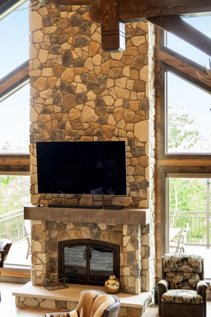 Rustic Fieldstone Fireplace with Raised Hearth Styled to Glow the Rustic Fieldstone Fireplace with Raised Hearth