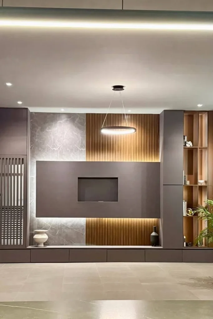 Two Story High Ceiling TV Wall with Double Panel Drama Styled to Glow the Two Story High Ceiling TV Wall with Double Panel Drama