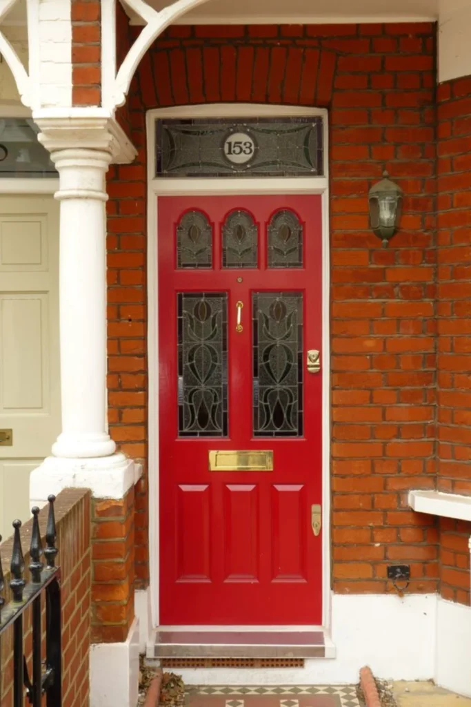 Victorian Red Door with Stained Glass Transom Styled to Glow the Victorian Red Door with Stained Glass Transom